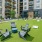 Large courtyard with lounge seating and activity field