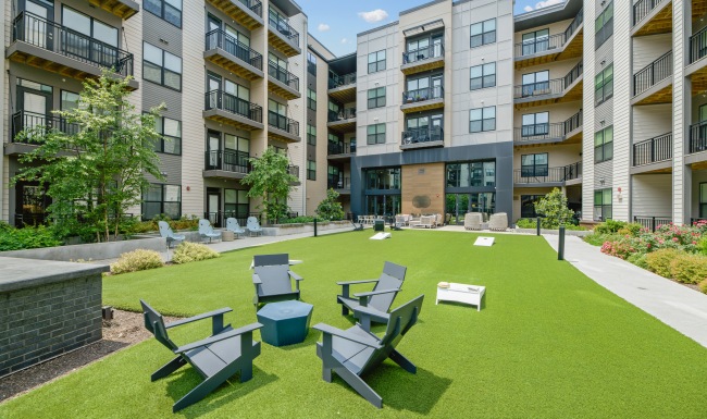 Courtyard Large courtyard lunge with games, seating and grilling.